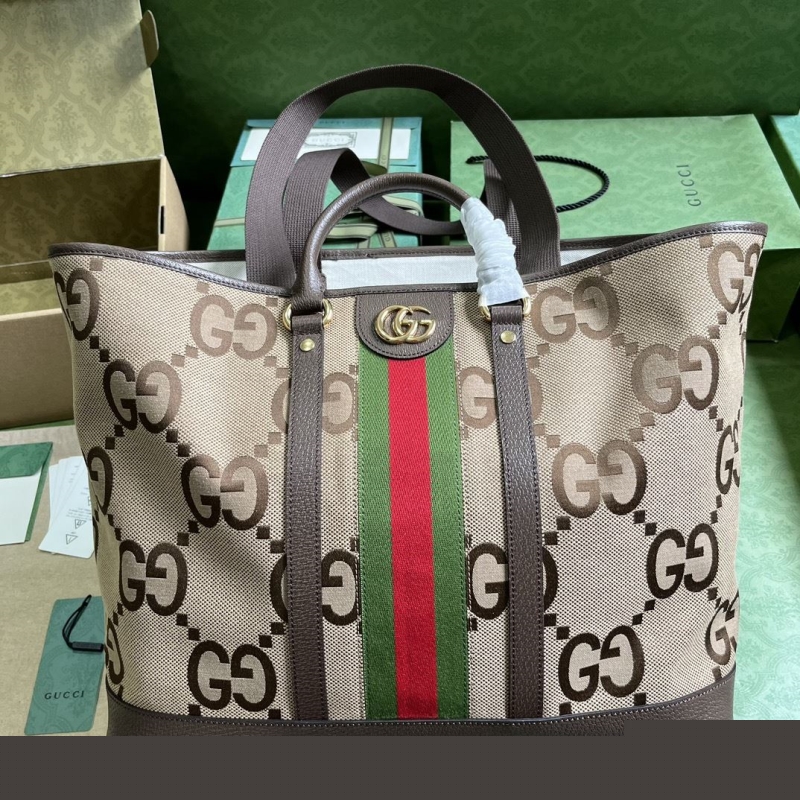 G*u*i shopping bags